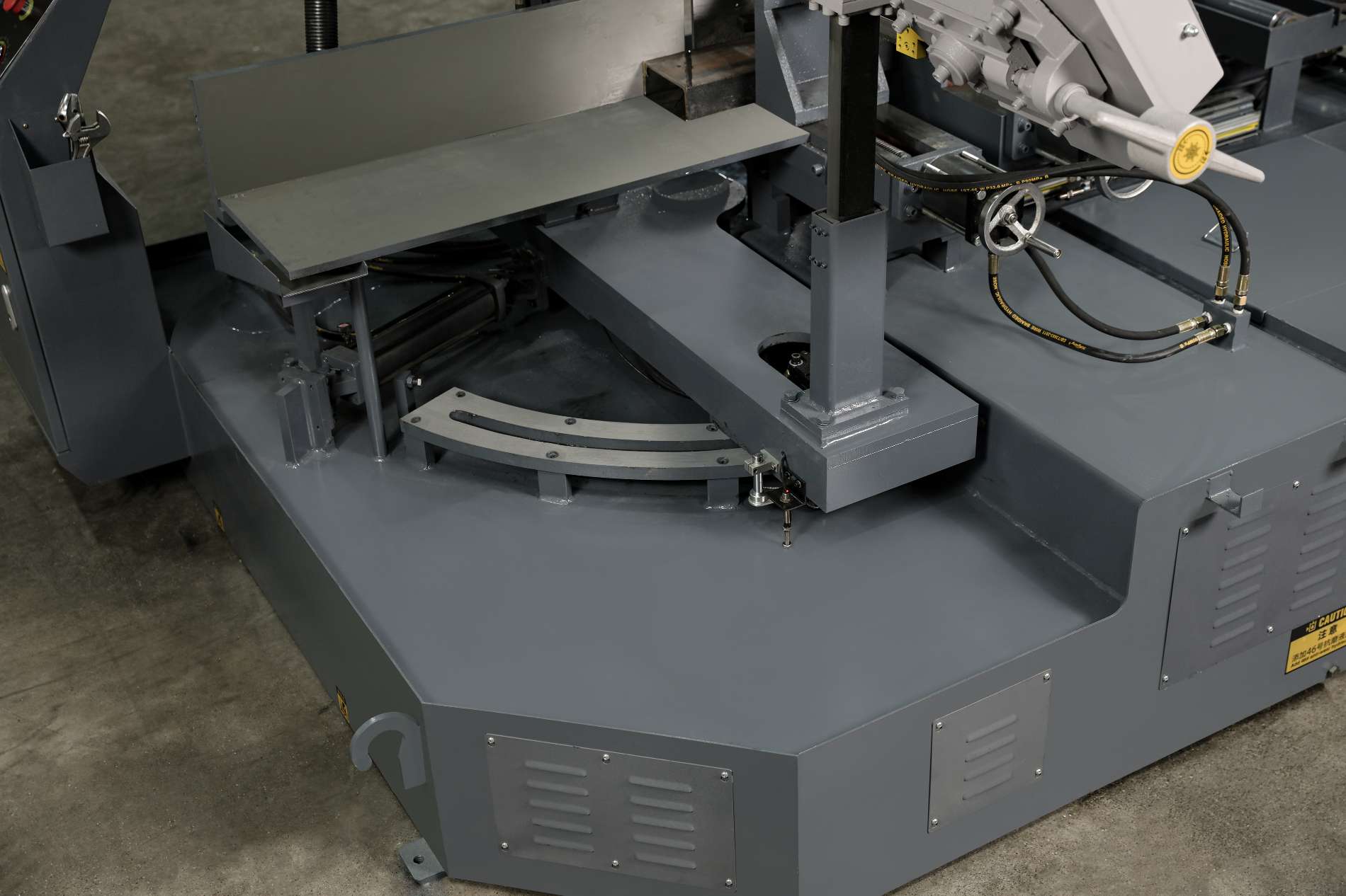 Hydraulic rotary base with encoder for precision 0 to 45 degree miter cutting on bandsaw by MFG