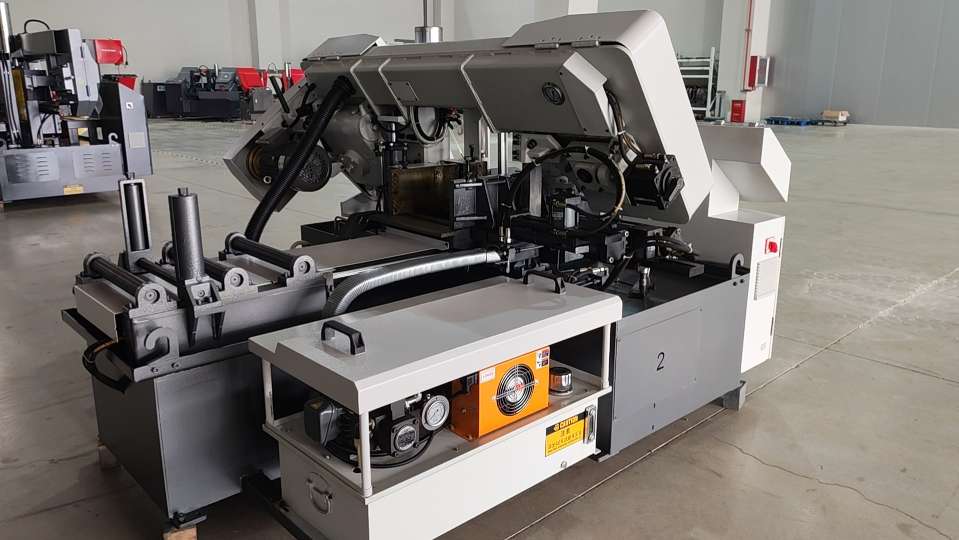 Side view of the M1-330C horizontal cutting saw showcasing the inclined discharge table and standard material rack setup