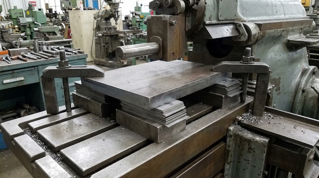 steel-plate supported-with-solid-packing-for-shaper-machine.jpg